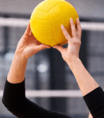 Playing volleyball